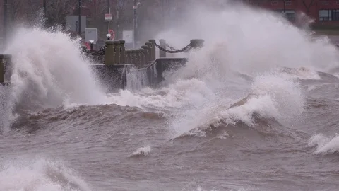 Dangerous waves crash into shore in typhoon and hurricane force wind storm Video stock 88517746