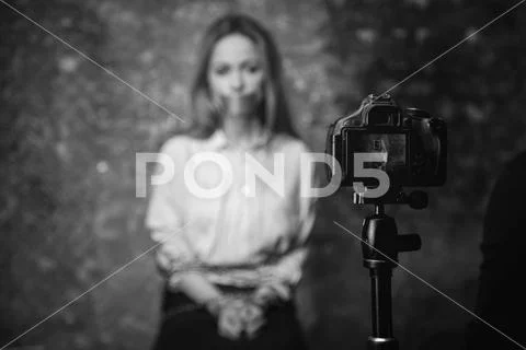 Dangerous wicked villain recording a video for ransom Stock Photos