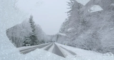 Dangerous Winter Driving - looking through a insufficiently de-iced windshield Stock-Footage 110789904