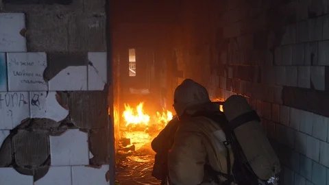 Dangerous work of firefighters.Extinguishing the explosion. Stock Footage 108457954