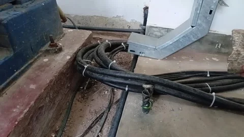 Dangerously Exposed Three-Phase Electrical Wires Covered by a Coconut Shell Video stock 328049339