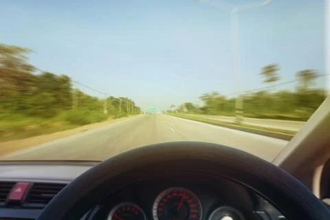 Dangers while driving on the road When there is light reflecting the sun on t Stock Photos