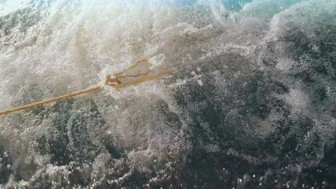 Dangling rope from a boat dangling along the waves Stock Footage 126066720