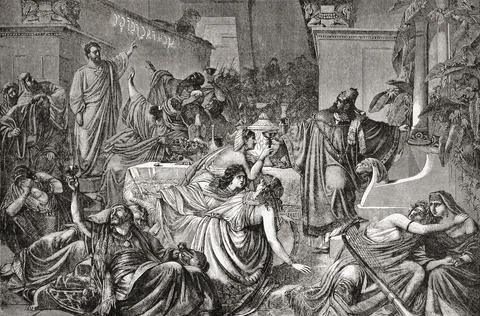 Daniel interpreting the writing on the wall in Babylon at Belshazzars Feast.  T Stock Photos