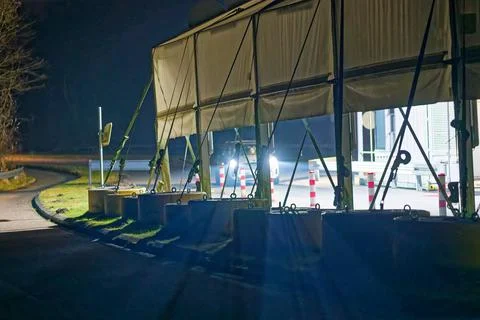 Danish Border checkpoint structure with lights at night near Flensburg Krusau Stock Photos