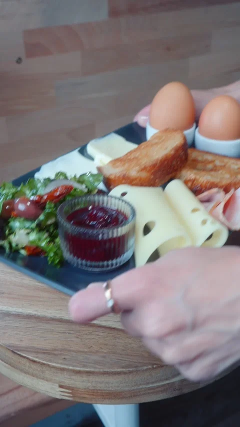 Danish Breakfast Plate Being Served on Table Stock Footage 339469892