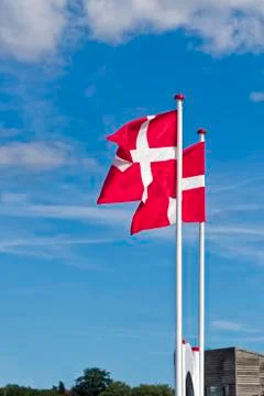 Danish flags exposed to the wind Stock Photos
