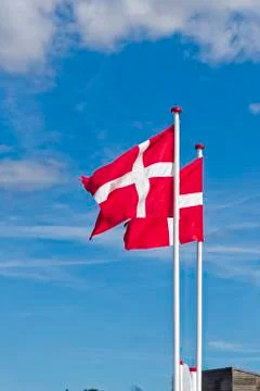 Danish flags exposed to the wind Stock Photos