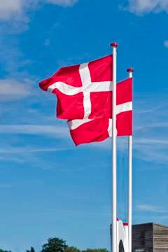 Danish flags exposed to the wind Stock Photos