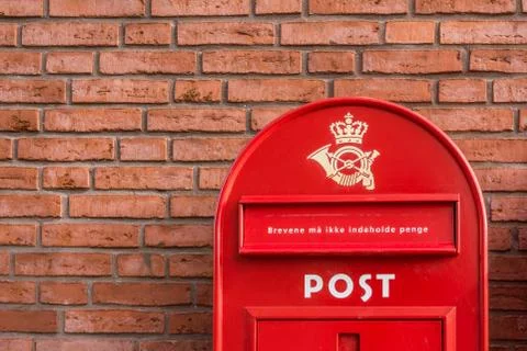 Danish mailbox on a brick wall Stock Photos