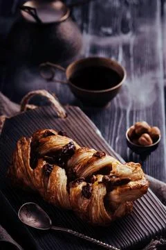 Danish pastry maple pecan with nuts and maple syrup. Stock Photos