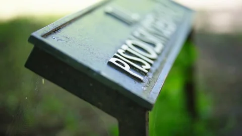 Danish sign with out of focus elements and focus moving around. Stockbeeldmateriaal 93168788