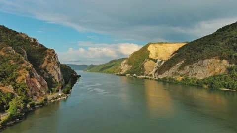 Danube river and mountains in Djerdap National Park at sunset Stock Footage 344744028