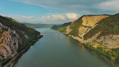 Danube river and mountains in Djerdap National Park at sunset Stock Footage 345447611