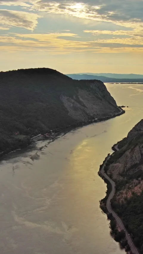 Danube river and mountains in Djerdap National Park at sunset Stock Footage 346653369
