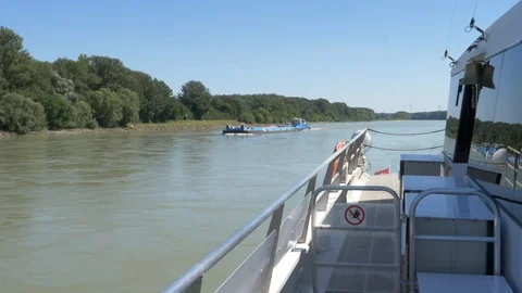 Danube river, barge passing by ferry Stock Footage 115845312