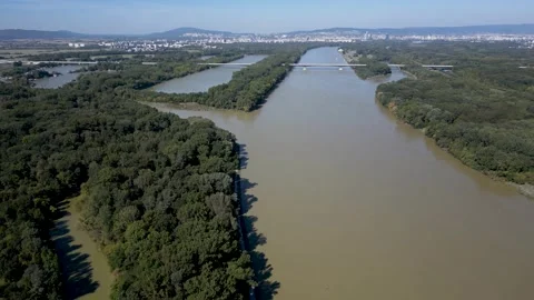 Danube River flooding, high angle view of water spreading into the forests, 4k Stock Footage 342939382