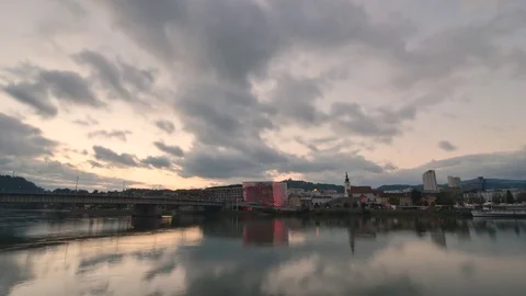Danube River time lapse featuring a barge cruising down the Danube River in Linz Stock Footage 70793342