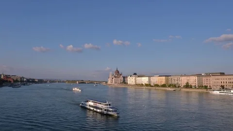 Danube River traffic rushes by in a time lapse from the Chain Bridge in Budapest Stock Footage 70793924