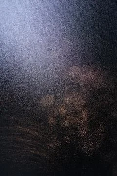Dappled sunlight in textured window abstract Stock Photos