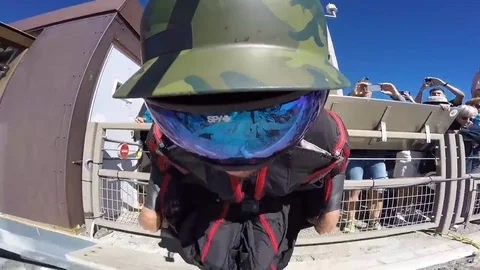 Daredevil performs extreme base jump on Mont Blanc Stock Footage 109275015