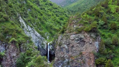 Darial Gorge: Towering Granite Cliffs and the Power of the Terek River on the Ru Stock Footage 306601558