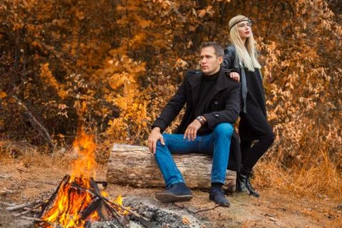 Daring couple and fire Foto stock