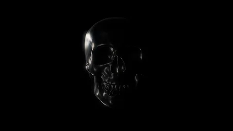 Dark 3D skull head with a light shining on it on a black background Stock Footage 123253981