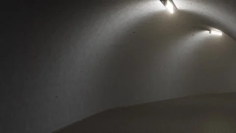 Dark 3d tunnel seamless looping. 4K animation of underground tunnel bunker bomb Stock Footage 243078439