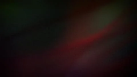 A dark 4K gradient background blending deep shades of green, red, and black.. Illustrazione stock
