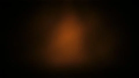 A dark 4K gradient background blending deep orange and black tones with a s.. Stock Illustration