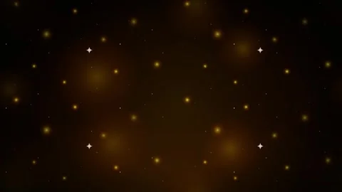 Dark abstract background filled with numerous bright golden star-like bokeh.. 動画素材 336364970