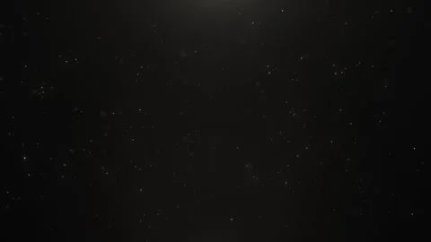 Dark abstract background with floating dust particles and subtle light rays Stock Footage 324957079
