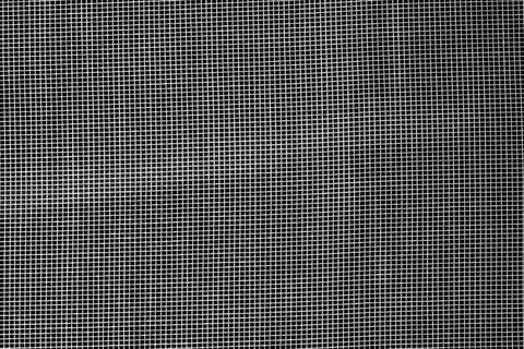 Dark abstract background: unique wavy pattern of overlaying two grids, blurre Stock Photos