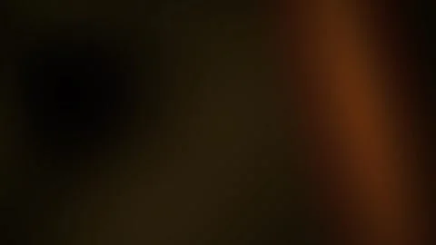 Dark Abstract Bokeh Background with Warm Brown and Amber Light Spots Gently.. Stock Footage 344719585