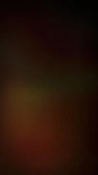 Dark abstract grainy blurred background with brown green black vertical for.. Stock Photos