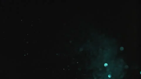 Dark abstract motion background with floating particles. Glowing dots and bokeh  Stock Footage 340450250