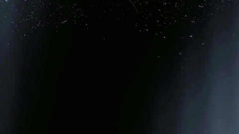 Dark abstract motion blur with dust particles swirling Stock Footage 340003811