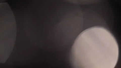 Dark abstract motion with large optical bokeh. Stock Footage 329775328