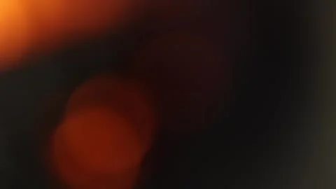Dark Abstract Orange Bokeh Light with Soft Motion Blur Stock Footage 325419393