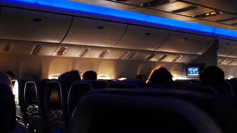 Dark airplane cabin interior in 4K Stock Footage 166817629