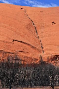 Dark algae-watermark of stepped dry waterfall at Uluru-Ayers Rock. NT-AUS Stock Photos