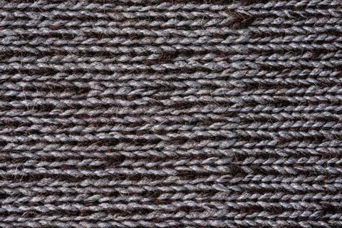 Dark alpaca wool knitted textile macro texture natural fiber background Stock Photos