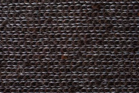 Dark alpaca wool knitted textile macro texture natural fiber background Stock Photos