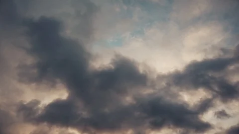 Dark altocumulus clouds smoke slowly flying in cloudy sun Stock Footage 102291455
