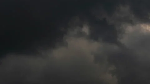 Dark and angry spring Cumulus storm clouds gathering in a time lapse Stock Footage 154297843
