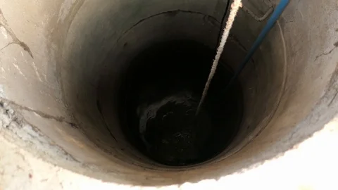 Dark and deep interior of a water well Stock-Footage 89606255