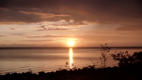 Dark and dramatic storm cloud sunset over the sea. Stock Footage 169405296