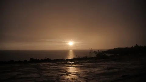 Dark and dramatic storm cloud sunset over the sea. Stock Footage 169405329