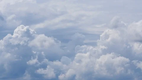 Dark and heavy storm clouds forming on a blue sky time lapse Stock Footage 120867470